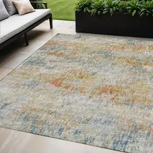 Photo of Gold Beige And Orange Abstract Washable Indoor Outdoor Area Rug