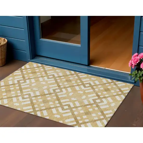 Gold Beige And Tan Geometric Washable Indoor Outdoor Area Rug Photo 1