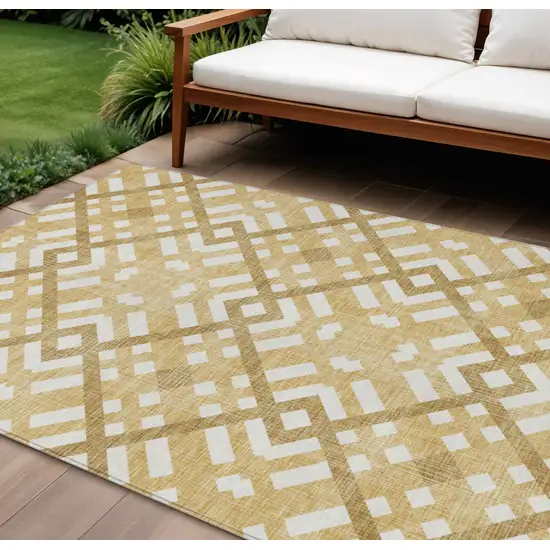 Gold Beige And Tan Geometric Washable Indoor Outdoor Area Rug Photo 1