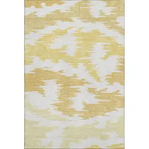 Photo of Gold Beige And Wheat Abstract Washable Area Rug With UV Protection
