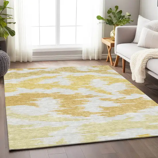 Gold Beige And Wheat Abstract Washable Area Rug With UV Protection Photo 4