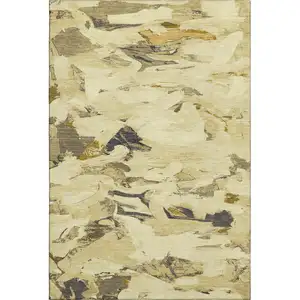 Photo of Gold Beige And Wheat Abstract Washable Area Rug With UV Protection
