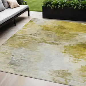 Photo of Gold Beige And Wheat Abstract Washable Indoor Outdoor Area Rug
