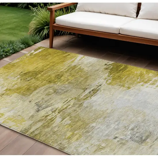 Gold Beige And Wheat Abstract Washable Indoor Outdoor Area Rug Photo 1