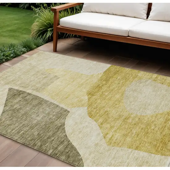 Gold Beige And Wheat Abstract Washable Indoor Outdoor Area Rug Photo 1
