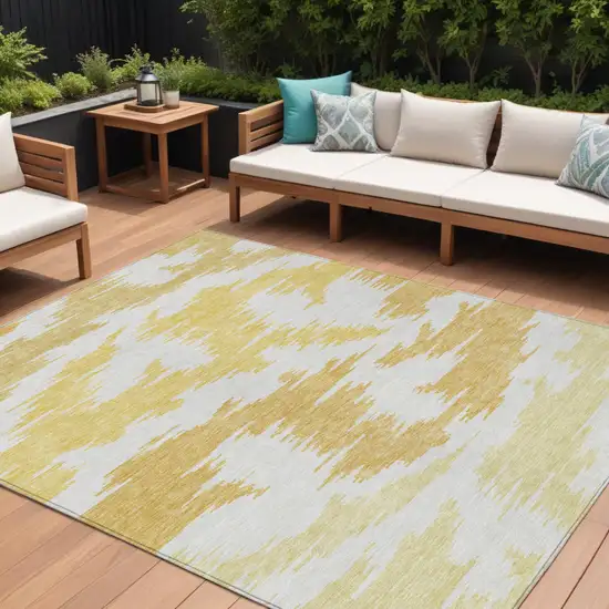 Gold Beige And Wheat Abstract Washable Indoor Outdoor Area Rug Photo 1