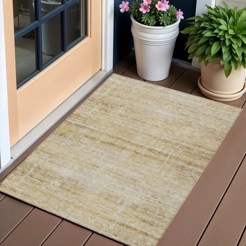 Gold Beige And Wheat Abstract Washable Indoor Outdoor Area Rug Photo 1