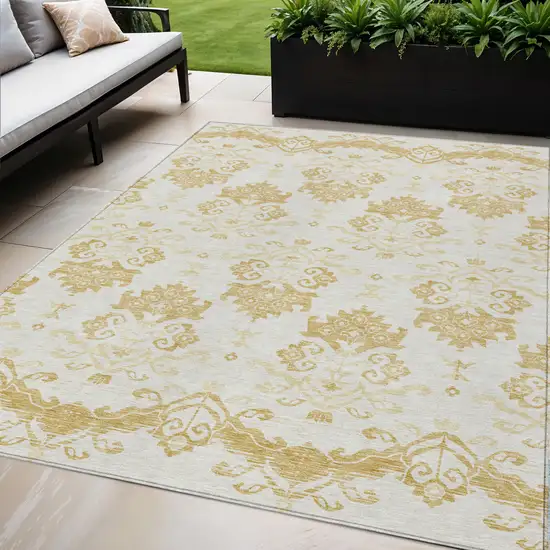 Gold Beige And Wheat Oriental Washable Indoor Outdoor Area Rug Photo 1