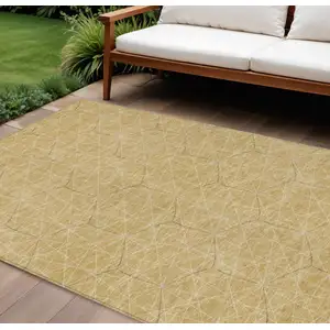 Photo of Gold Black And Beige Geometric Washable Indoor Outdoor Area Rug