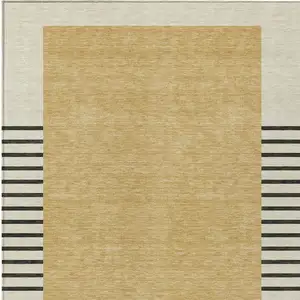Photo of Gold Black And Beige Striped Washable Indoor Outdoor Area Rug