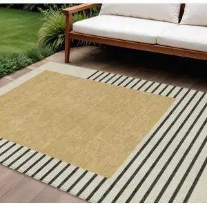 Photo of Gold Black And Beige Striped Washable Indoor Outdoor Area Rug