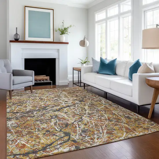 Gold Black And Ivory Abstract Washable Indoor Outdoor Area Rug Photo 6