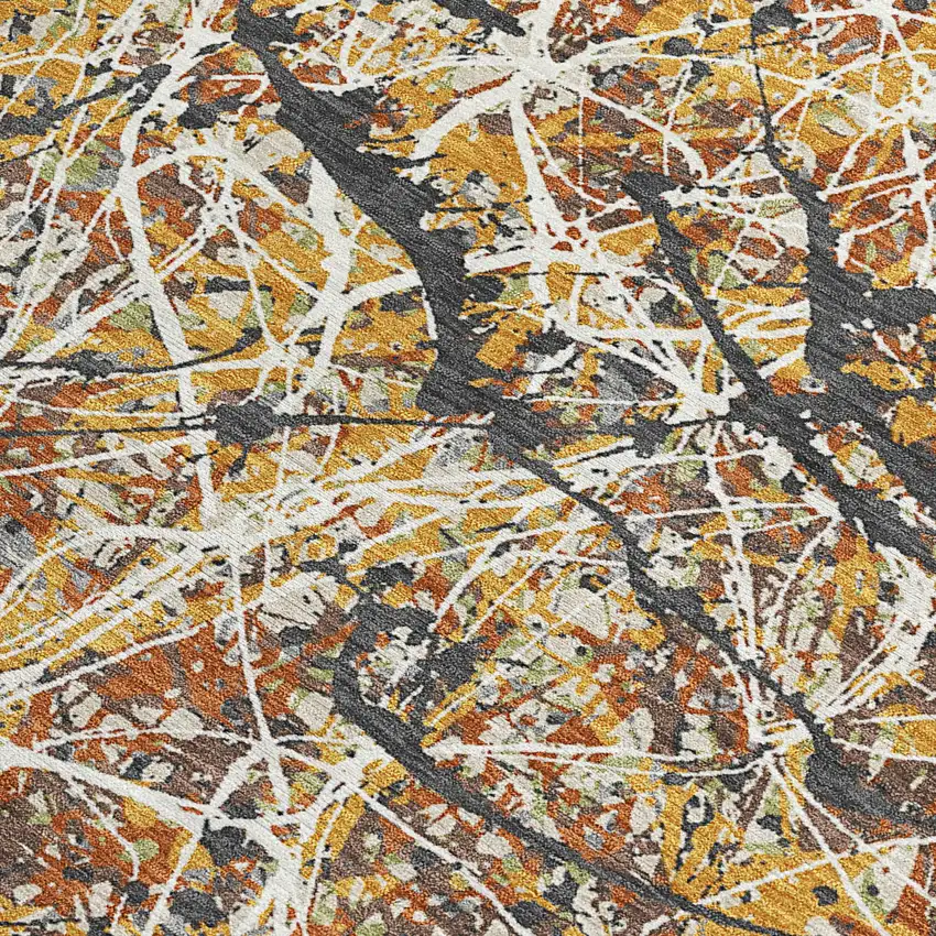 Gold Black And Ivory Abstract Washable Indoor Outdoor Area Rug Photo 3