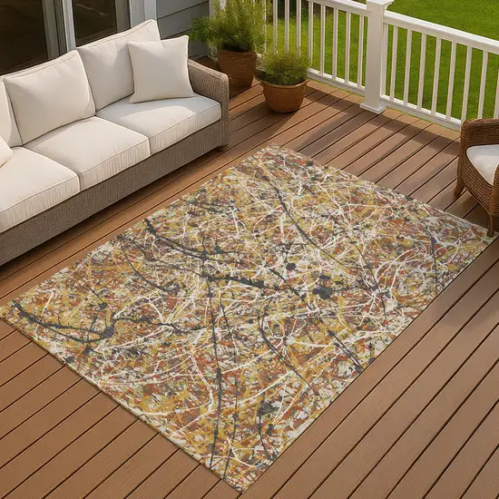 Gold Black And Ivory Abstract Washable Indoor Outdoor Area Rug Photo 4