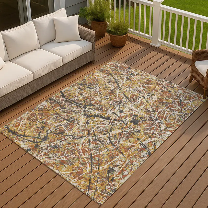 Gold Black And Ivory Abstract Washable Indoor Outdoor Area Rug Photo 4