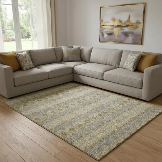 Gold Blue And Ivory Floral Medallion Washable Area Rug With UV Protection Photo 1