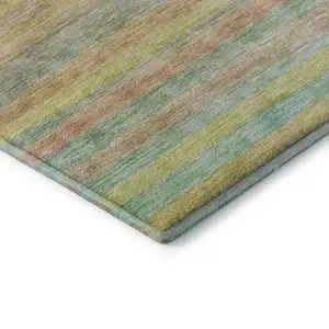 Photo of Gold Blush And Teal Striped Washable Area Rug With UV Protection