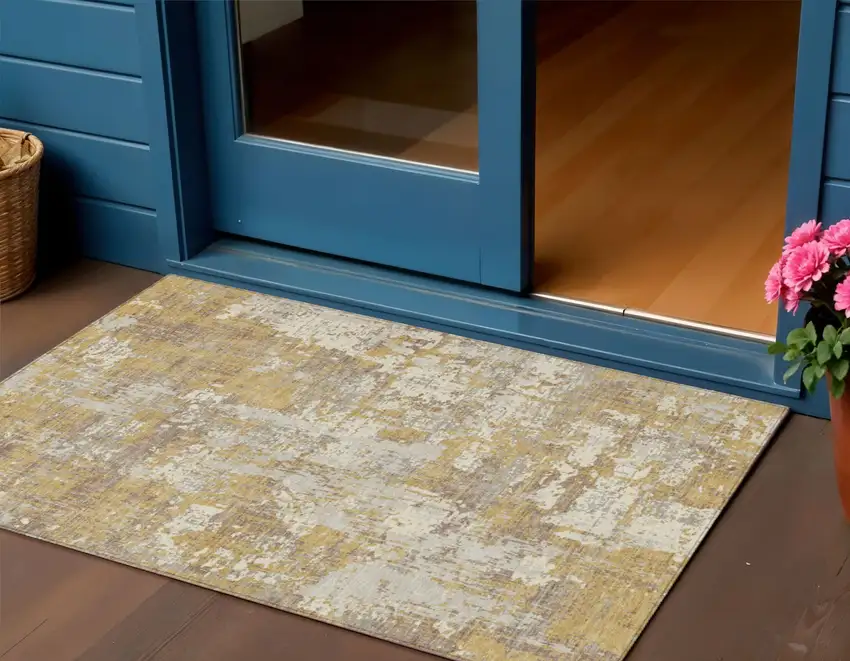 Gold Brown And Beige Abstract Washable Indoor Outdoor Area Rug Photo 1