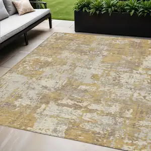 Photo of Gold Brown And Beige Abstract Washable Indoor Outdoor Area Rug