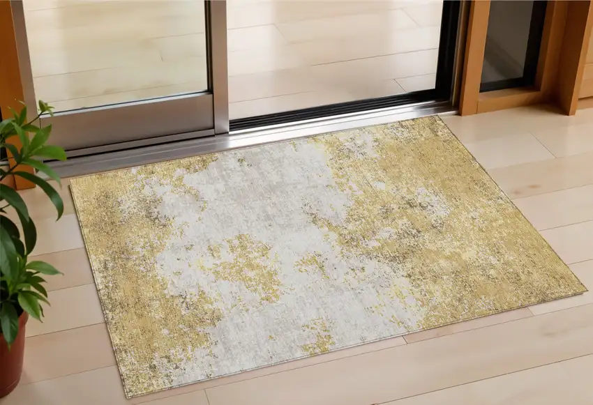 Gold Brown And Beige Abstract Washable Indoor Outdoor Area Rug Photo 1