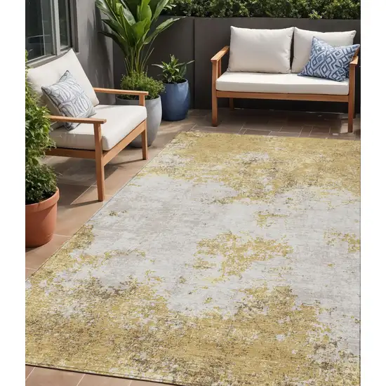 Gold Brown And Beige Abstract Washable Indoor Outdoor Area Rug Photo 1
