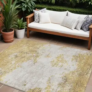 Photo of Gold Brown And Beige Abstract Washable Indoor Outdoor Area Rug