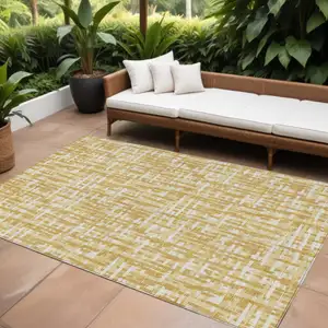 Photo of Gold Brown And Beige Abstract Washable Indoor Outdoor Area Rug