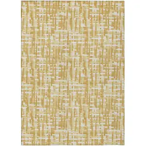 Photo of Gold Brown And Beige Abstract Washable Indoor Outdoor Area Rug