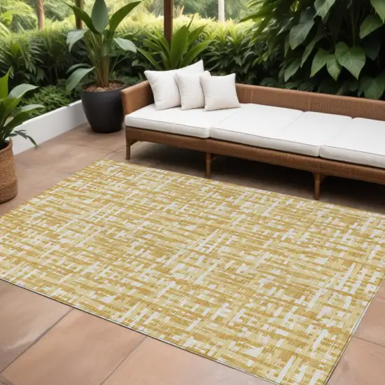 Gold Brown And Beige Abstract Washable Indoor Outdoor Area Rug Photo 1