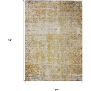 Photo of Gold Brown And Beige Geometric Washable Indoor Outdoor Area Rug