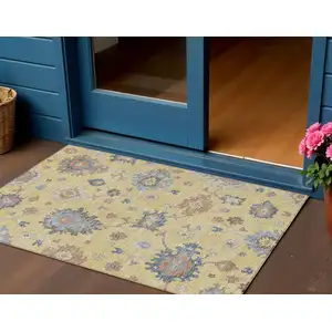 Photo of Gold Brown And Blue Floral Washable Indoor Outdoor Area Rug