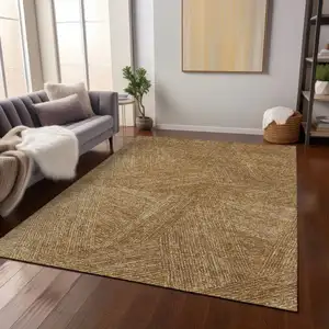 Photo of Gold Brown And Ivory Abstract Washable Indoor Outdoor Area Rug