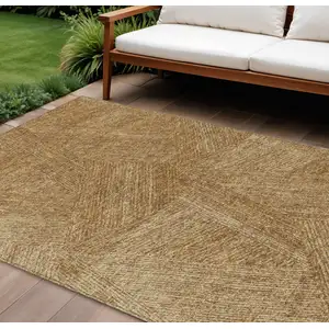 Photo of Gold Brown And Ivory Abstract Washable Indoor Outdoor Area Rug