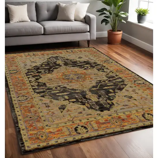 Black and Gold Oriental Power Loom Area Rug Photo 1