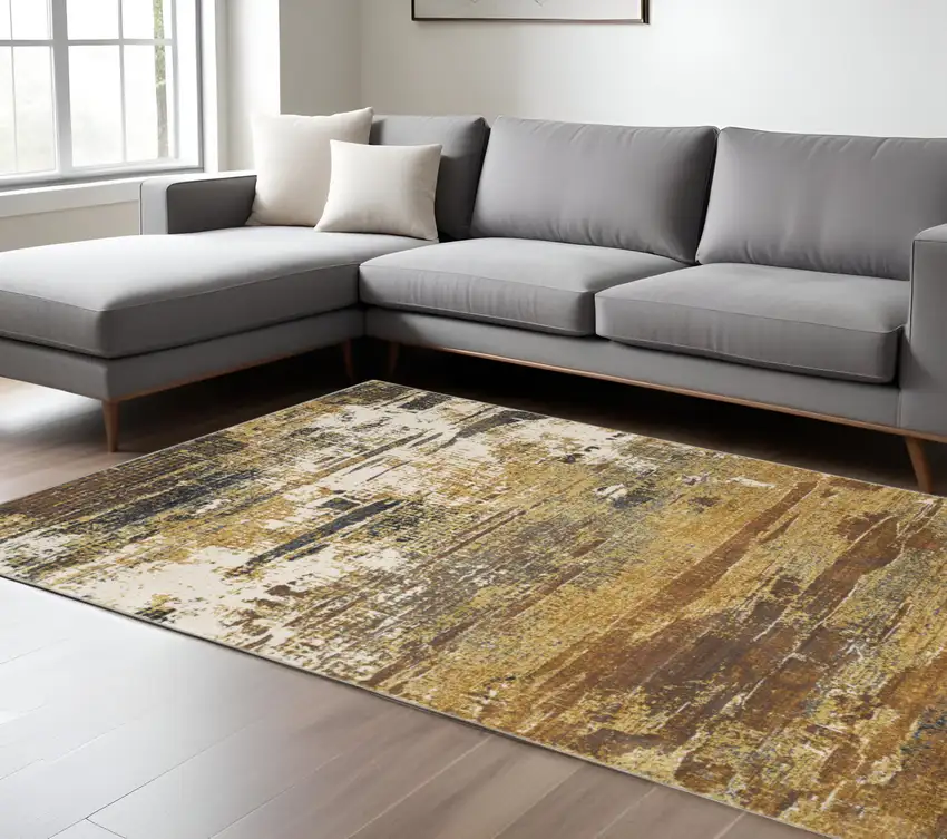 Gold And Beige Abstract Area Rug Photo 1