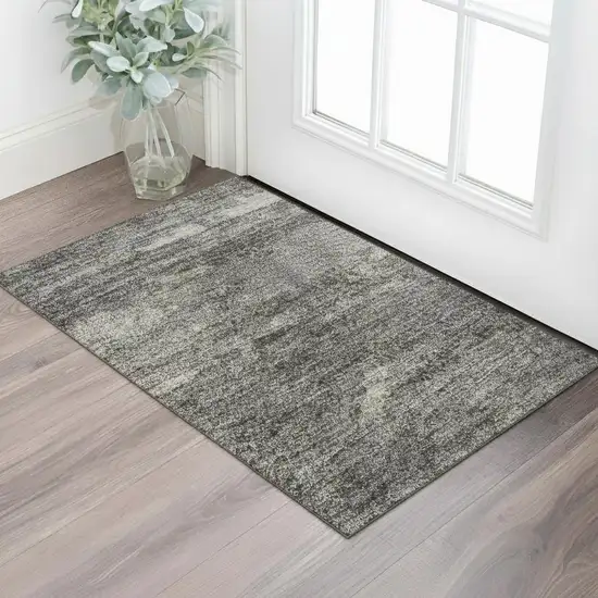 Gold Charcoal And Gray Abstract Washable Area Rug With UV Protection Photo 2