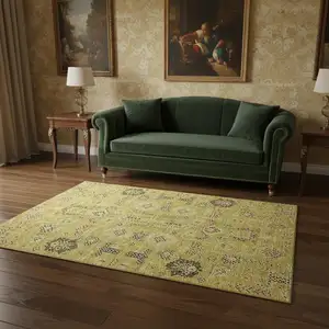 Photo of Gold Charcoal And Gray Oriental Washable Area Rug With UV Protection