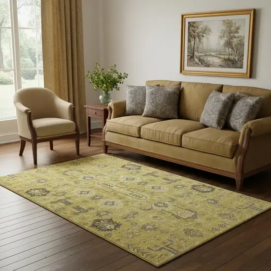 Gold Charcoal And Gray Oriental Washable Area Rug With UV Protection Photo 1