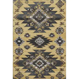Photo of Gold Charcoal And Gray Tribal Washable Area Rug With UV Protection