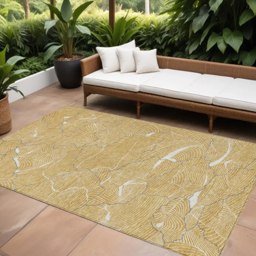 Gold Charcoal And Ivory Abstract Washable Indoor Outdoor Area Rug Photo 1