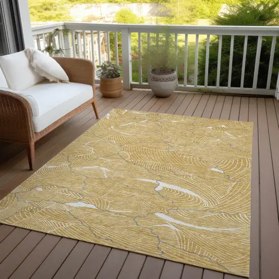 Gold Charcoal And Ivory Abstract Washable Indoor Outdoor Area Rug Photo 8