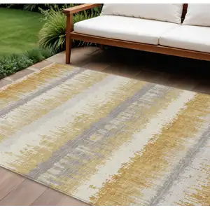 Photo of Gold Copper And Gray Striped Washable Indoor Outdoor Area Rug