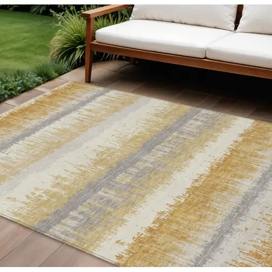 Gold Copper And Gray Striped Washable Indoor Outdoor Area Rug Photo 1