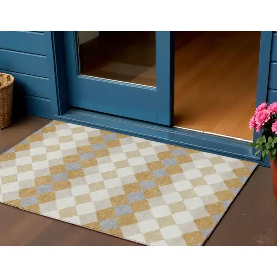 Gold Copper And Ivory Geometric Washable Indoor Outdoor Area Rug Photo 1