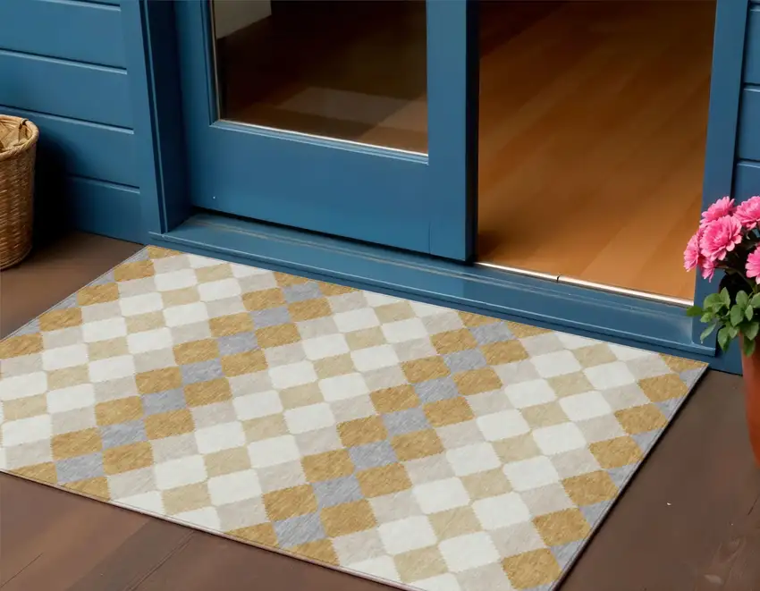 Gold Copper And Ivory Geometric Washable Indoor Outdoor Area Rug Photo 1