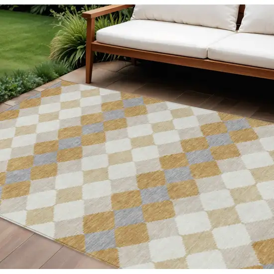 Gold Copper And Ivory Geometric Washable Indoor Outdoor Area Rug Photo 1