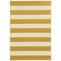 Photo of Gold Geometric Stain Resistant Indoor Outdoor Area Rug
