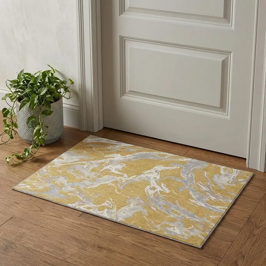 Gold Gray And Beige Abstract Washable Area Rug With UV Protection Photo 1