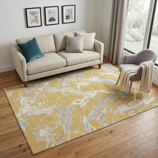 Gold Gray And Beige Abstract Washable Area Rug With UV Protection Photo 1