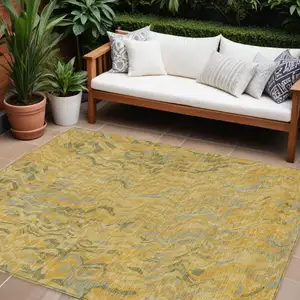 Photo of Gold Gray And Beige Abstract Washable Indoor Outdoor Area Rug